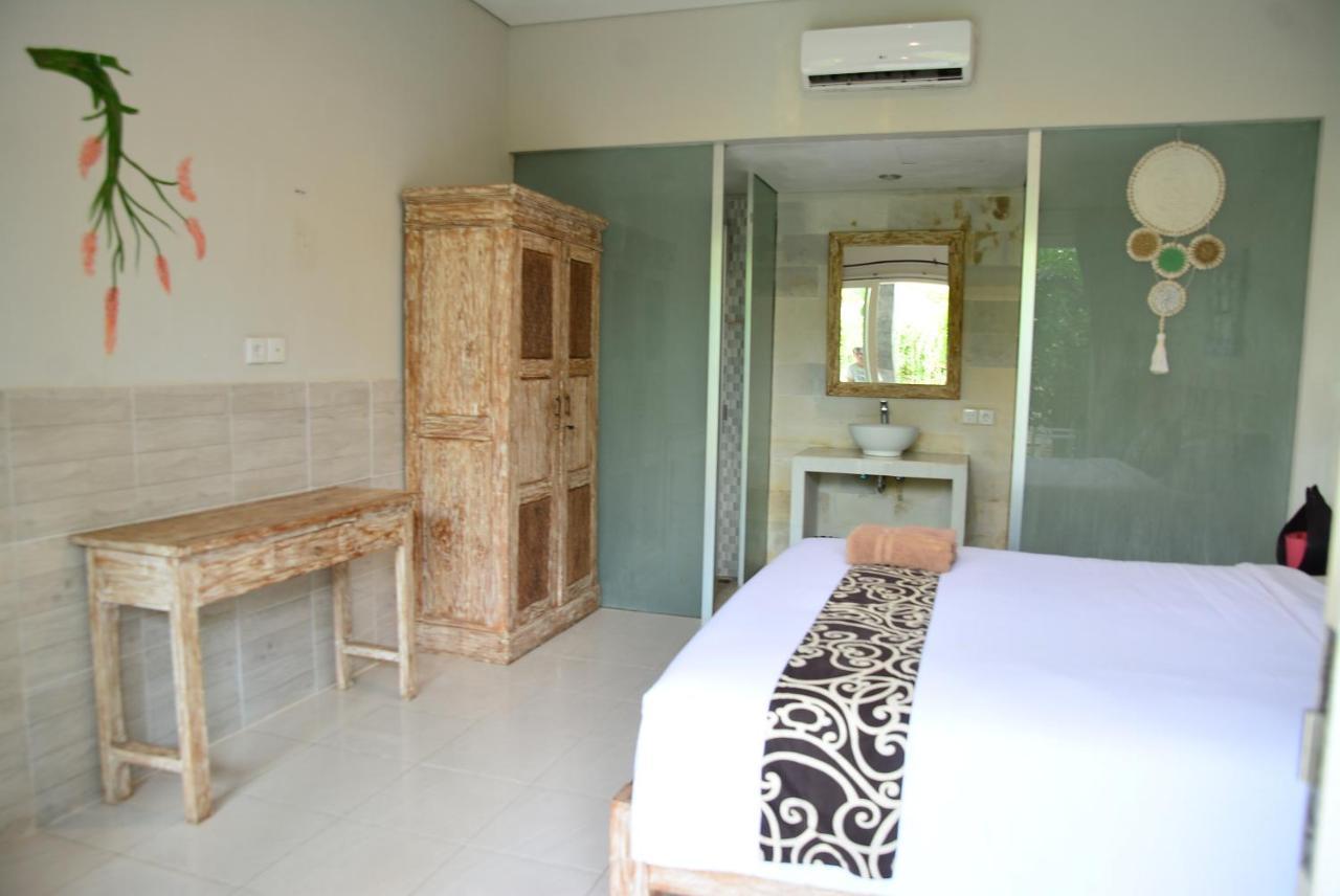 Asung Guesthouse Canggu Eksteriør billede